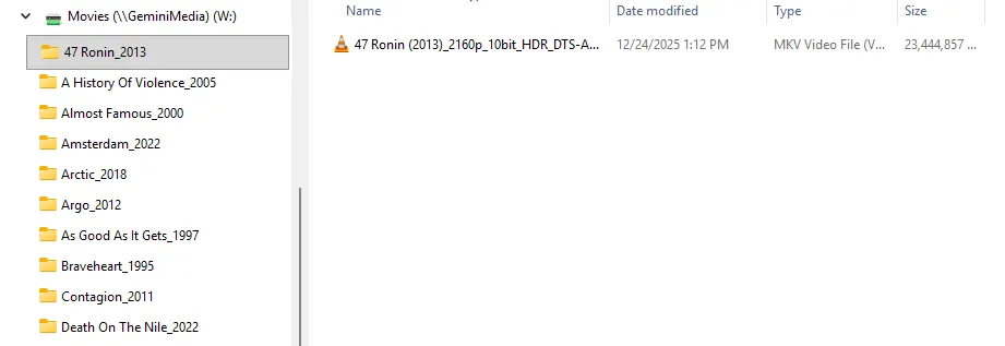 Movie stored directly under the movies root, named “{Title}_{Year}”